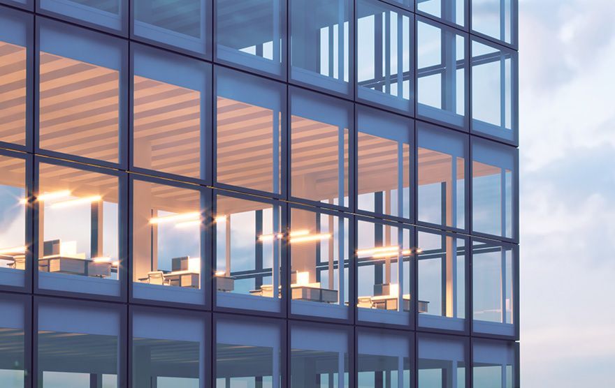float glass panels on building with sky view